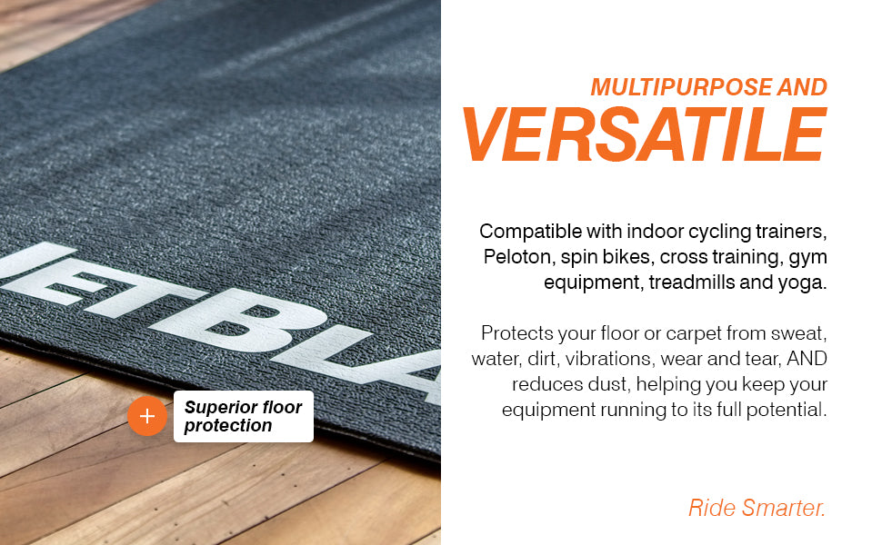 JetBlack Trainer Mat on a wooden floor, with promotional text on the right describing its versatility and floor protection benefits  accessories