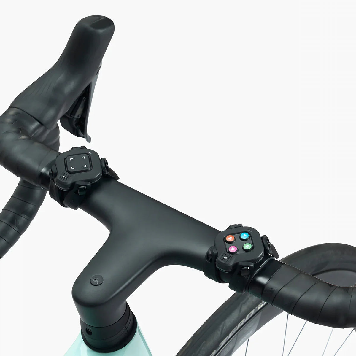 Zwift Click controllers mounted on road bike handlebars